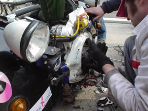 Geoff Archer working on the Simply the Breast car